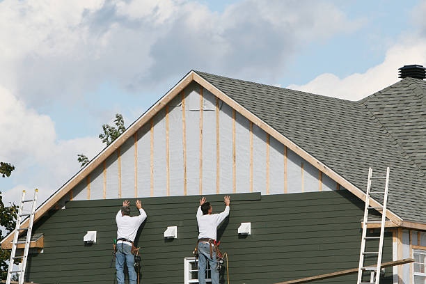 Professional Emergency Siding Repair technician working in Mayer, MN